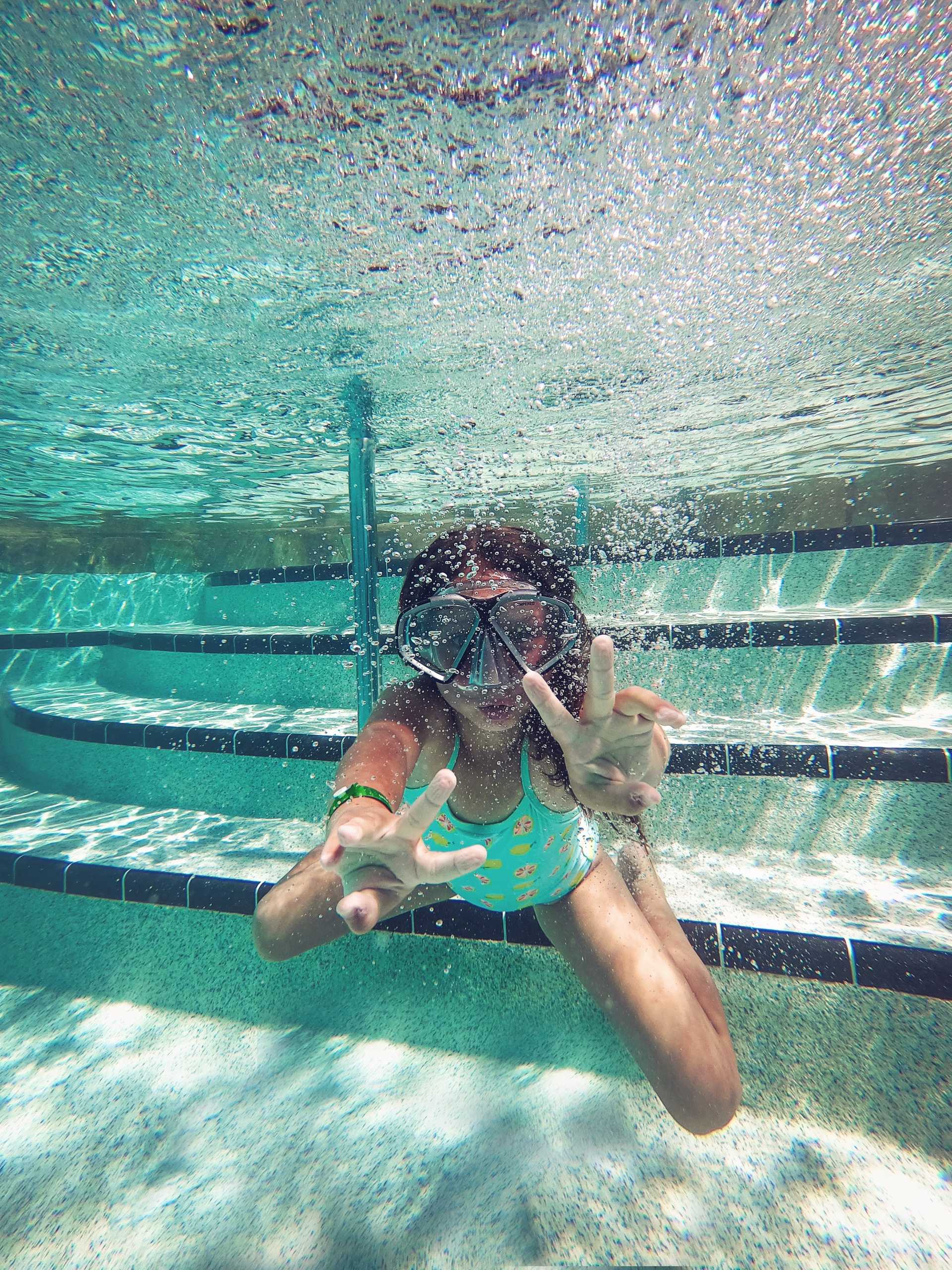 Girl swimming underwater